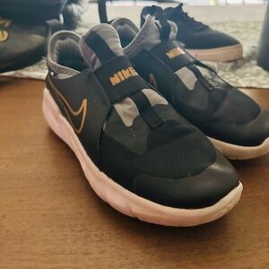 Black and Gold Nike Shoes